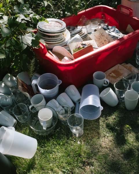 Used dishes outside.